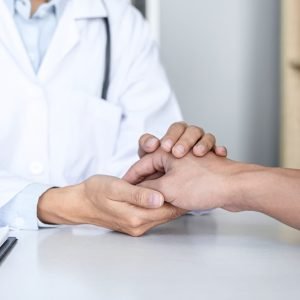 close-up-of-doctor-touching-patient-hand-for-encou-2025-10-15-04-58-15-utc (1)